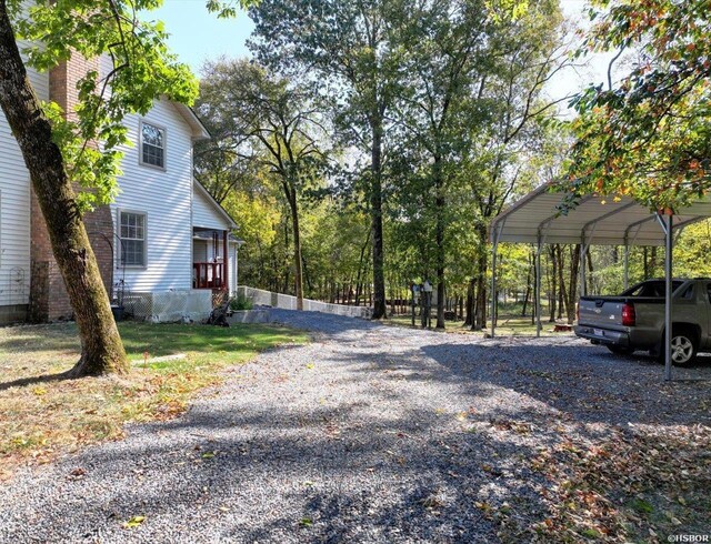 view of road with driveway