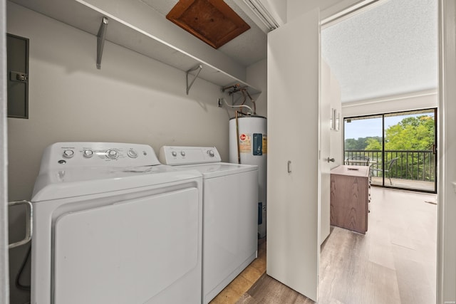 5371 Central Ave Unit 5L, Hot Springs, AR 71913 - laundry room with washer and dryer, electric panel, electric water heater, and light wood finished floors
