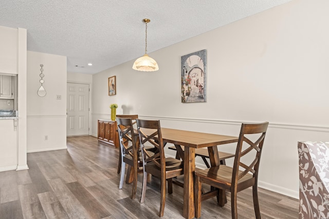 5371 Central Ave Unit 5L, Hot Springs, AR 71913 - dining space featuring a textured ceiling, dark wood-style floors, and recessed lighting