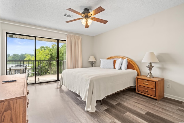 5371 Central Ave Unit 5L, Hot Springs, AR 71913 - bedroom featuring access to exterior, wood finished floors, a textured ceiling, and a ceiling fan