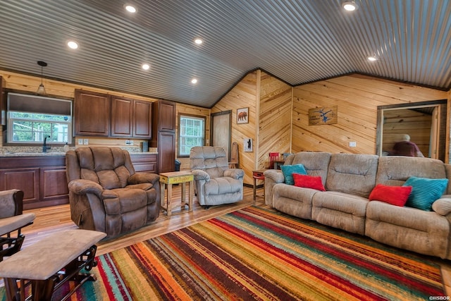 152 Anderson Loop, Amity, AR 71921 - living room featuring lofted ceiling, wood walls, recessed lighting, wood ceiling, and light wood-type flooring