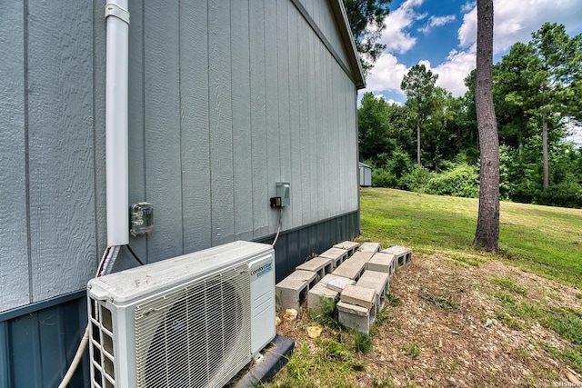 152 Anderson Loop, Amity, AR 71921 - view of home's exterior with a cooling unit and a lawn