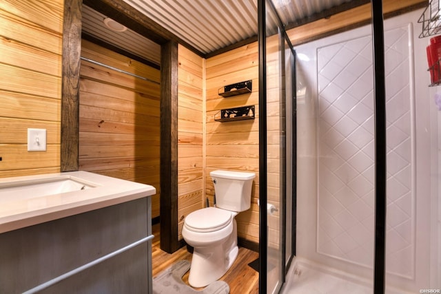 152 Anderson Loop, Amity, AR 71921 - full bath with vanity, wood walls, a shower stall, and wood finished floors