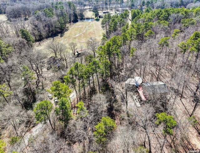 aerial view featuring a view of trees