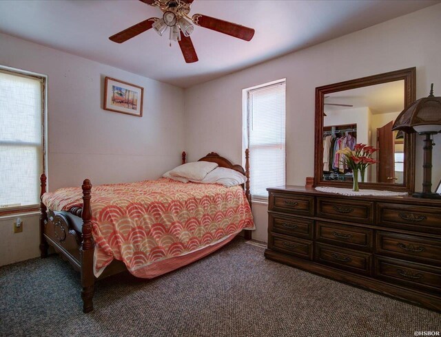 bedroom with carpet floors and a ceiling fan