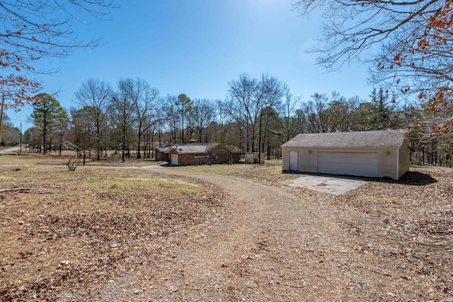 view of road with driveway