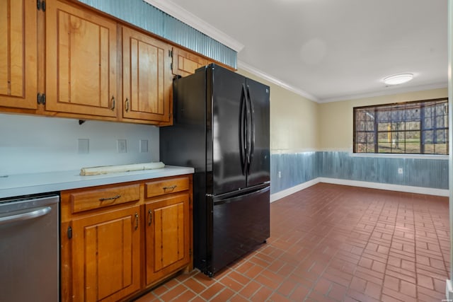 kitchen featuring a wainscoted wall, freestanding refrigerator, ornamental molding, light countertops, and dishwasher