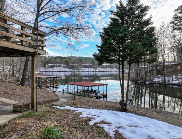 view of dock featuring a water view and boat lift