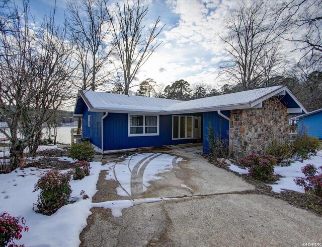 view of front of house featuring stone siding