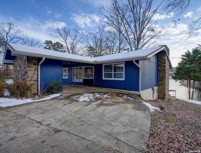 view of front of home featuring stone siding