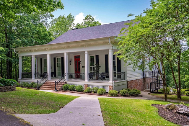 498 Lantern Ter, Hot Springs, AR 71913 - neoclassical home with a porch, a front yard, and stairway