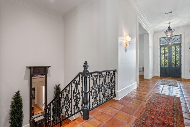 498 Lantern Ter, Hot Springs, AR 71913 - tiled entryway with crown molding, baseboards, and a chandelier