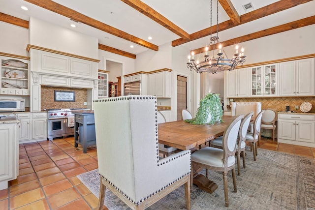498 Lantern Ter, Hot Springs, AR 71913 - dining area with a chandelier, light tile patterned floors, beam ceiling, and recessed lighting