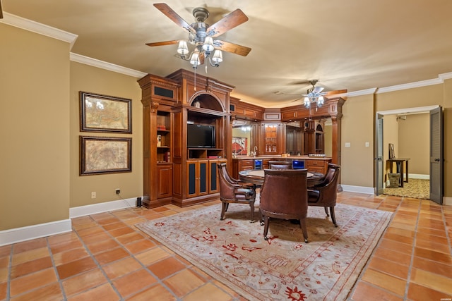 498 Lantern Ter, Hot Springs, AR 71913 - dining space with a ceiling fan, ornamental molding, baseboards, and light tile patterned floors