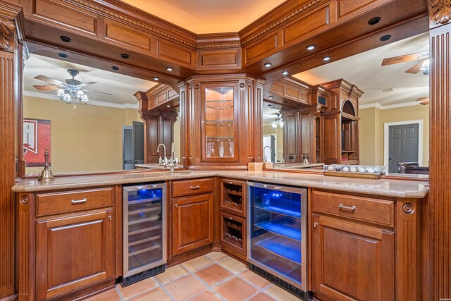 498 Lantern Ter, Hot Springs, AR 71913 - indoor wet bar with wine cooler, ceiling fan, crown molding, and light tile patterned floors
