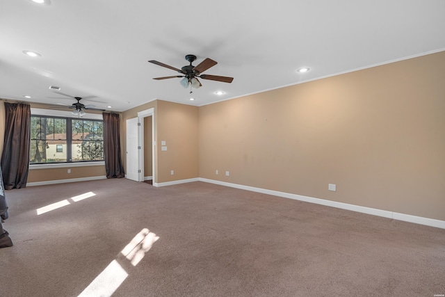 unfurnished room with carpet floors, baseboards, ornamental molding, and recessed lighting