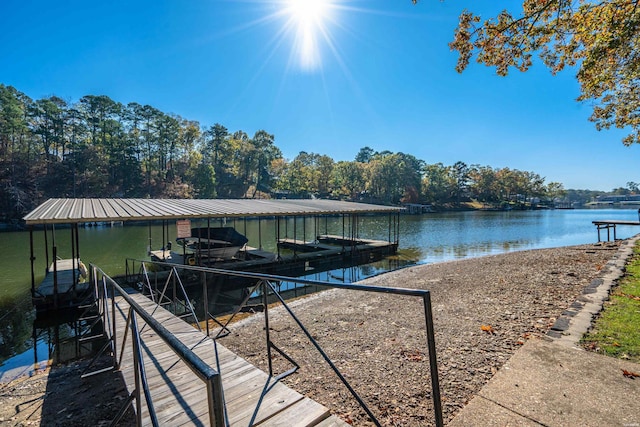 view of dock with a water view and boat lift