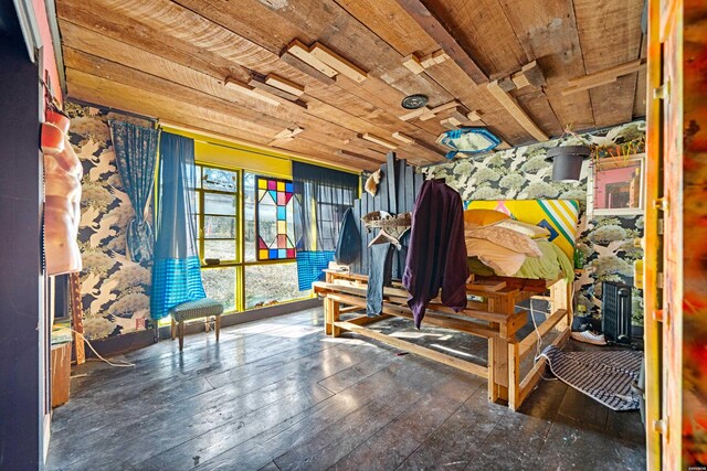 interior space featuring dark wood-type flooring and wooden ceiling