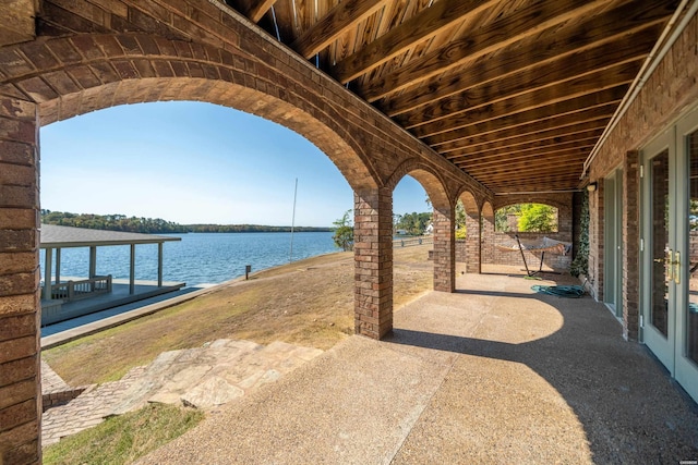 view of patio / terrace featuring a water view