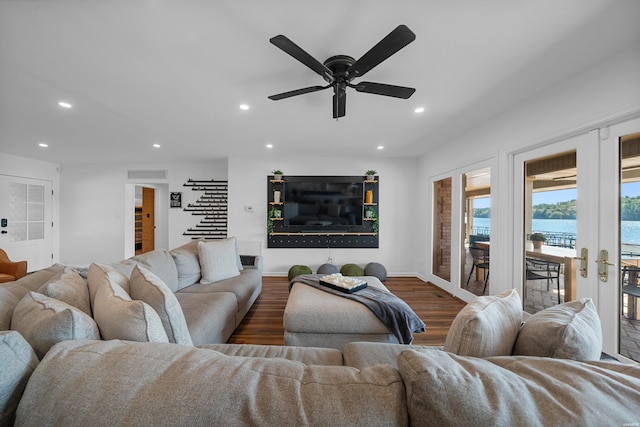 living room with baseboards, stairway, dark wood-type flooring, french doors, and recessed lighting