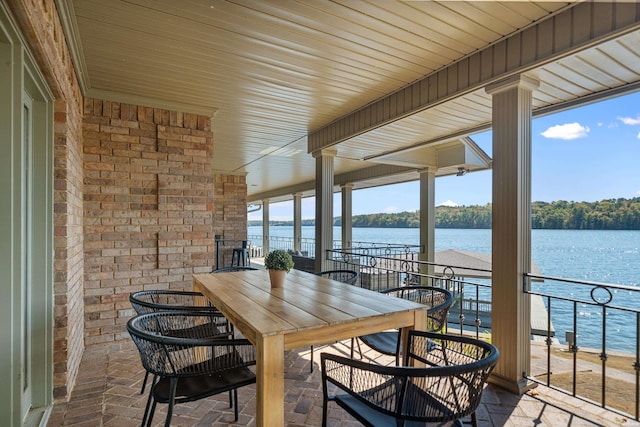 interior space featuring a water view and a wealth of natural light