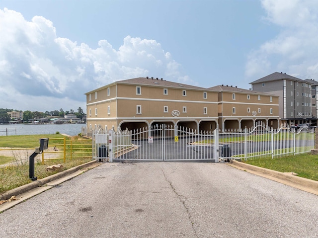 188 Villa Pointe Unit C, Hot Springs, AR 71901 - view of property featuring a water view and driveway