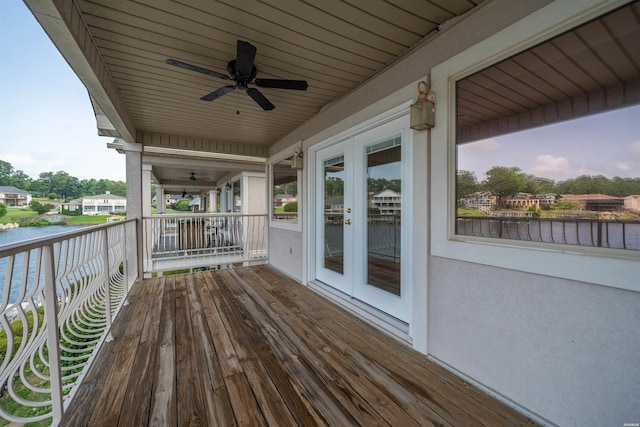 188 Villa Pointe Unit C, Hot Springs, AR 71901 - wooden terrace with a water view, ceiling fan, and french doors