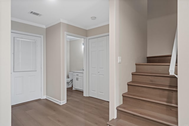 188 Villa Pointe Unit C, Hot Springs, AR 71901 - staircase featuring wood finished floors, crown molding, and baseboards