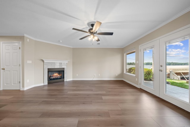 188 Villa Pointe Unit C, Hot Springs, AR 71901 - unfurnished living room with french doors, wood finished floors, ceiling fan, a fireplace, and ornamental molding