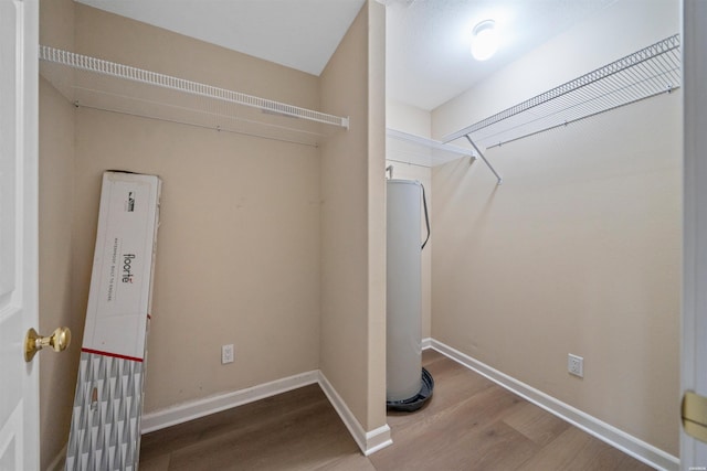 188 Villa Pointe Unit C, Hot Springs, AR 71901 - laundry area with wood finished floors and baseboards