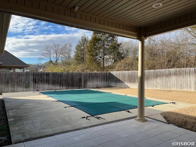 view of pool featuring a fenced in pool, a patio area, and a fenced backyard