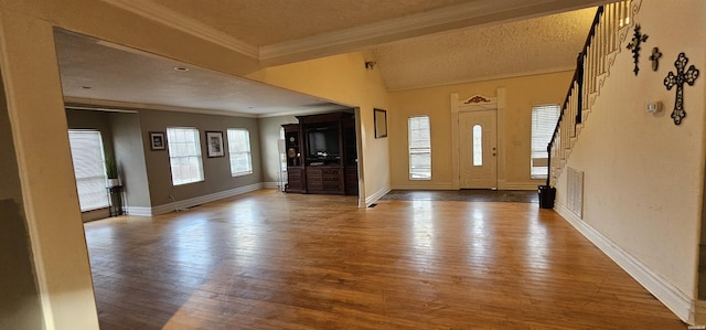 109 Gabor Ln, Hot Springs, AR 71913 - entryway featuring light wood-type flooring, baseboards, ornamental molding, and a textured ceiling