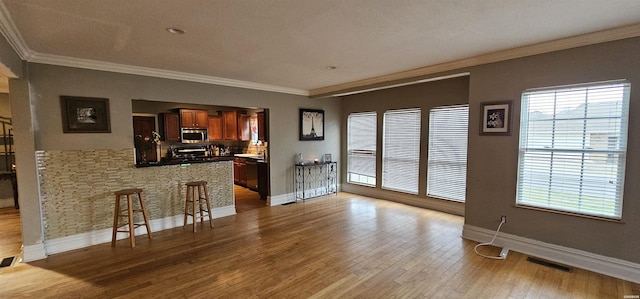 109 Gabor Ln, Hot Springs, AR 71913 - interior space featuring ornamental molding, light wood-type flooring, and visible vents