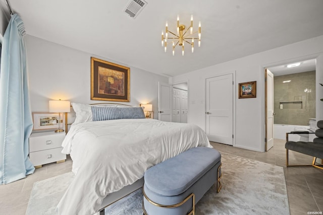 5371 Central Ave Unit 3C, Hot Springs, AR 71913 - bedroom featuring light tile patterned floors, a chandelier, and ensuite bathroom