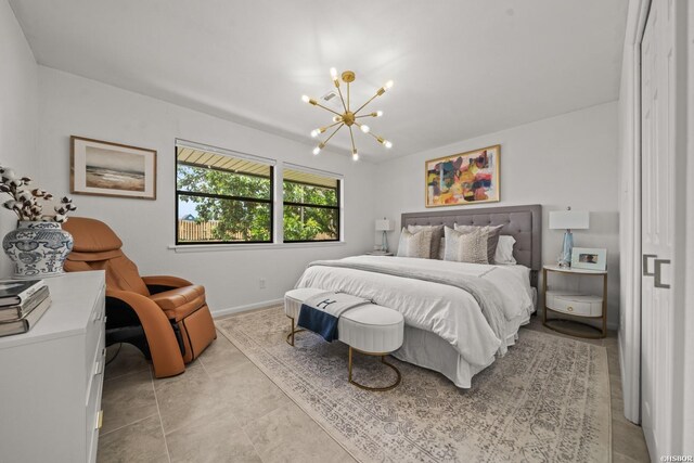 5371 Central Ave Unit 3C, Hot Springs, AR 71913 - bedroom with a chandelier and baseboards