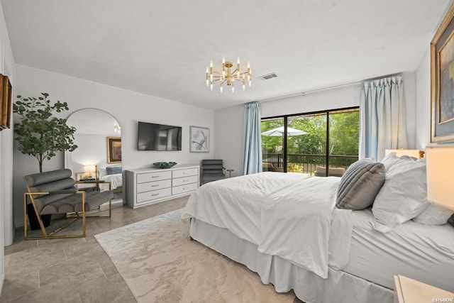 5371 Central Ave Unit 3C, Hot Springs, AR 71913 - bedroom with access to outside and a chandelier
