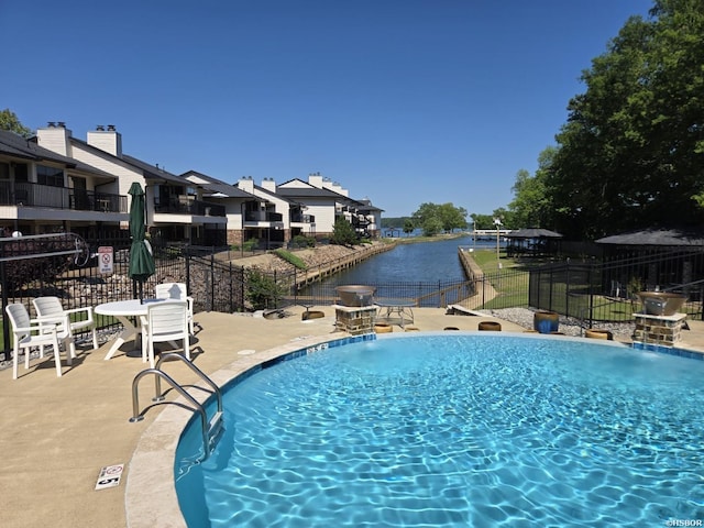 5371 Central Ave Unit 3C, Hot Springs, AR 71913 - community pool with fence, a patio, and a water view
