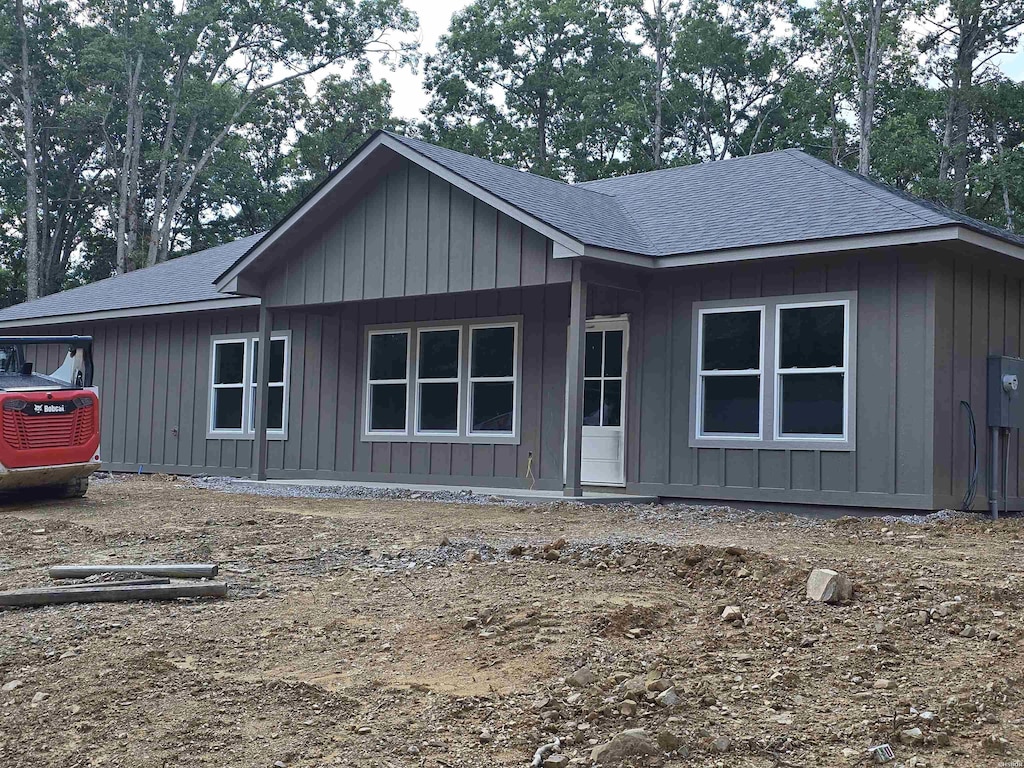 132 Columbia Ct, Hot Springs, AR 71913 - ranch-style house with board and batten siding and a shingled roof