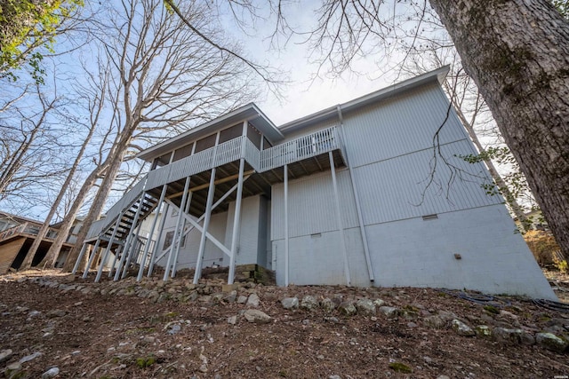 rear view of house with crawl space