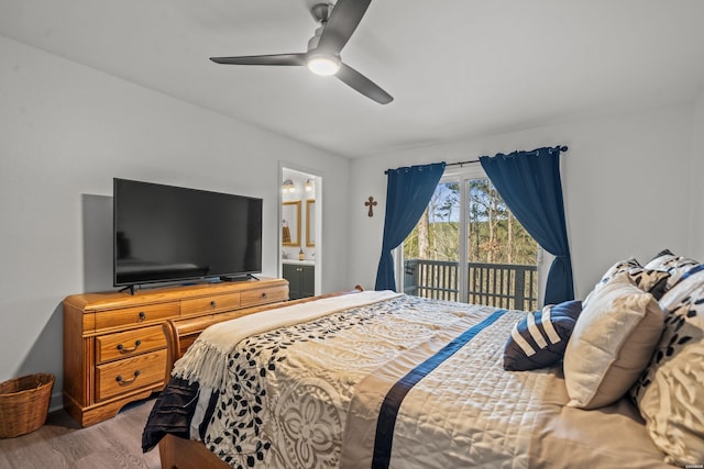 bedroom featuring access to exterior, a ceiling fan, wood finished floors, and ensuite bathroom