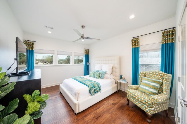 bedroom with baseboards, visible vents, a ceiling fan, dark wood-type flooring, and recessed lighting