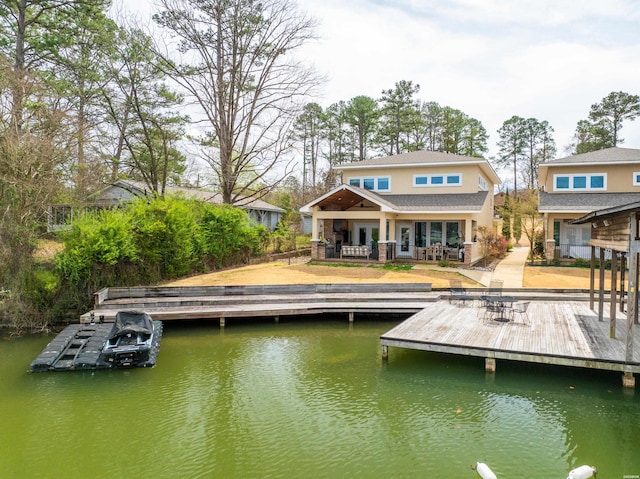 view of dock with a water view