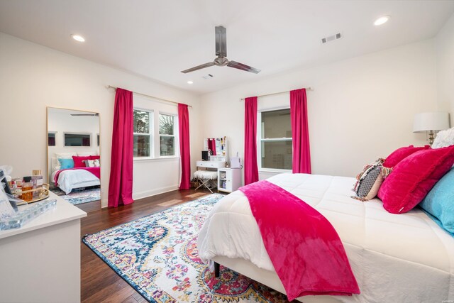 bedroom with recessed lighting, dark wood-style flooring, visible vents, and ceiling fan