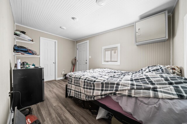 bedroom featuring dark wood-style floors