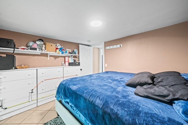 bedroom featuring light tile patterned floors