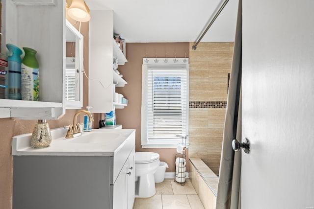 full bathroom featuring toilet, curtained shower, tile patterned floors, and vanity