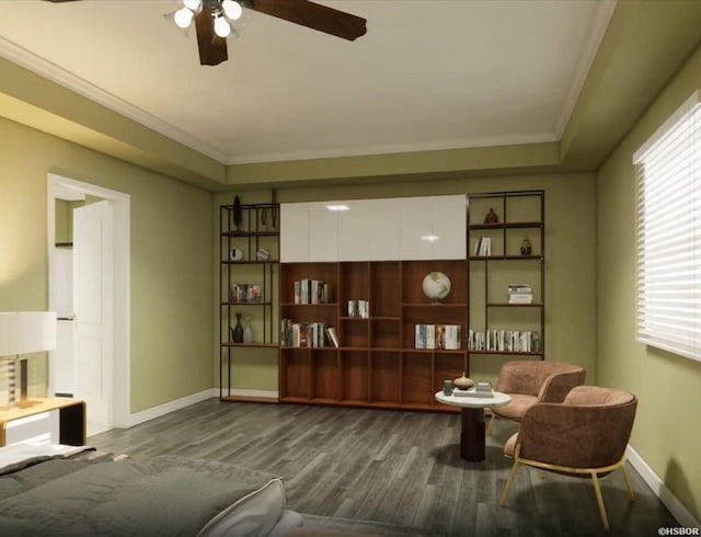 sitting room featuring dark wood-style floors, ceiling fan, baseboards, and crown molding