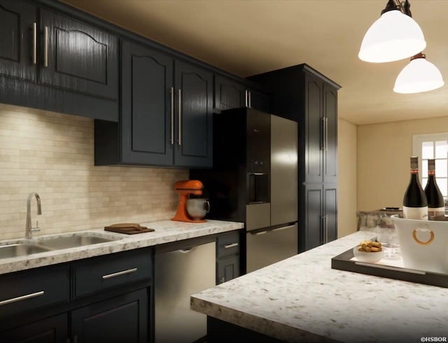 kitchen featuring stainless steel appliances, light countertops, hanging light fixtures, decorative backsplash, and a sink