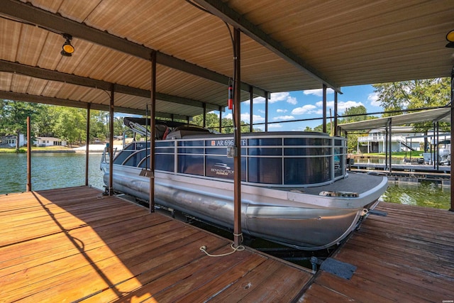 dock area featuring a water view and boat lift