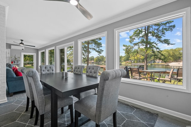 sunroom / solarium with a wall mounted air conditioner, a water view, plenty of natural light, and ceiling fan